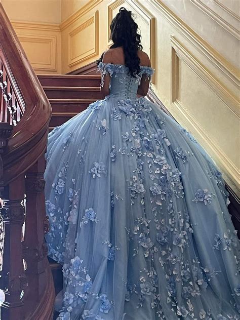 blue quinceanera dresses with butterflies.